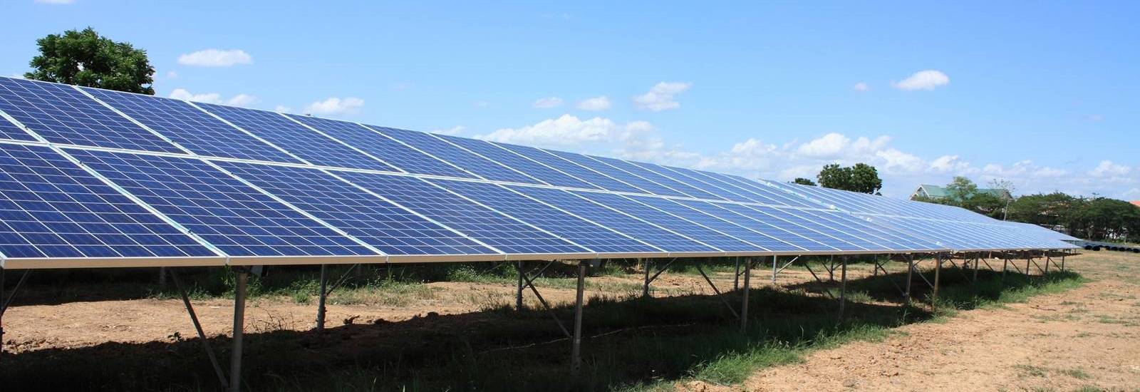 Solar Panels Against The Deep Blue Sky